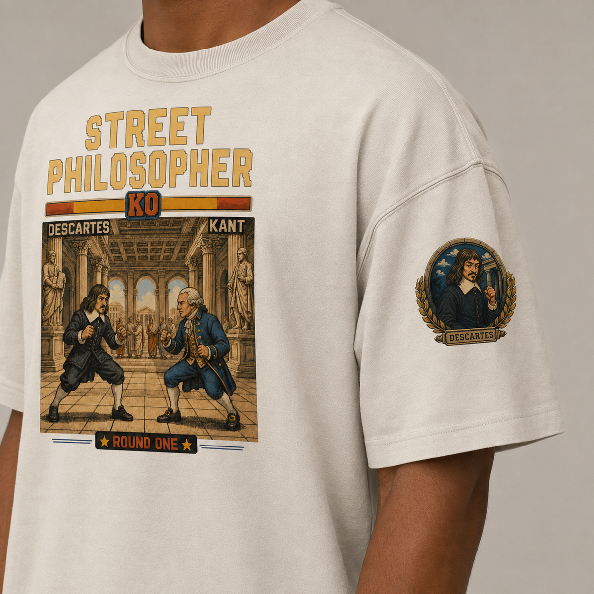 Close-up of the Descartes left-sleeve print on the premium oversized tee